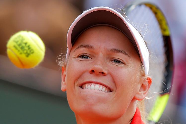 Caroline Wozniacki havde god grund til at være tilfreds, da duellen med Svetlana Kuznetsova var forbi. Danskeren er i kvartfinalen i Paris.   