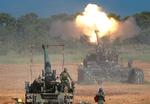 Taiwan føler sig truet af Kina. Billedet viser en militærøvelse i Taiwan sidste år. 