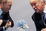 Trump mødtes to gange og havde samtaler med den russiske præsident Putin, da de var til G20-møde i Hamborg i juli måned.  Akrivfoto Evan Vucci