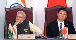 Den indiske præsident, Narendra Modi (tv), har ligesom den kinesiske præsident, Xi Jinping, slået sig op på national stolthed. Her ses de sammen til et topmøde i Indien i oktober sidste år. 