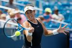 Wimbledonmesteren Garbine Muguruza tager til US Open med en frisk turneringssejr efter at have vundet finalen i Cincinatti. 