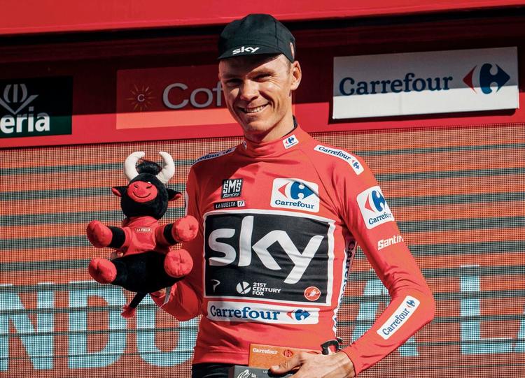 Chris Froome i den røde førertrøje, som han også bar en enkelt dag i 2011. 