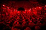 Soldiers in full gear on a C-17 military transport from Manas Air Force Base in Kyrgyzstan to Mazar-i-Sharif Afghanistan
