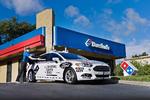 Pizzakæden Domino's tester sammen med Ford udbringning af mad i selvkørende biler. Foto: Ford Motor Company
    
   