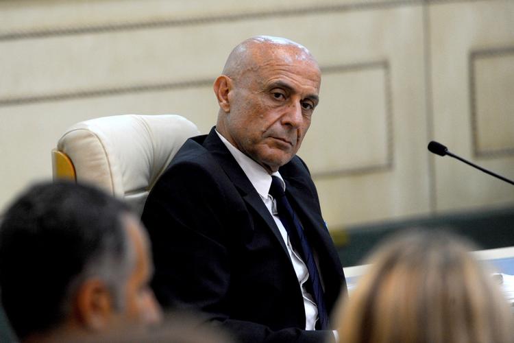 Den italienske indenrigsminister, Marco Minniti, har ifølge Corriere della Sera og andre medier ført forhandlinger med militsledere om at tilbageholde migranter, hvilket regeringen dog afviser. Arkivfoto Riadh Dridi