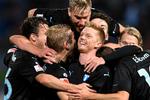 Anders Christiansen i midten lagde op til to og scorede selv det tredje mål, da Malmö FF for 20. gang blev svensk mester. Foto: Petter Arvidsson/Ritzau Foto 