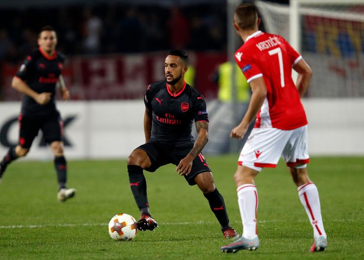 Theo Walcott lagde med hovedet op til Olivier Girouds sejrsmål. 