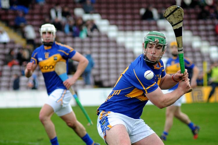 John O'Dwyer i aktion for Tipperary mod  Galway i National Hurling League i 2014. Senere på året var han med til at vinde den såkaldte All-Ireland finale på Croke Park.  Det menes, at hurling-sporten er 3.000 år gammelt.  