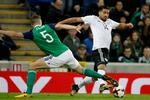 Nordirland og  Jonny Evans blev kørt over to gange i kvalifikationen af Emre Can og Tyskland. Verdensmestrene sejrede 2-0 og 3-1.  
