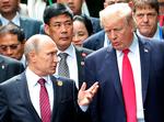 Trump møder Ruslands præsident,  Vladimir Putin, til Apec-topmødet i Vietnam. Billedet er taget i går.  