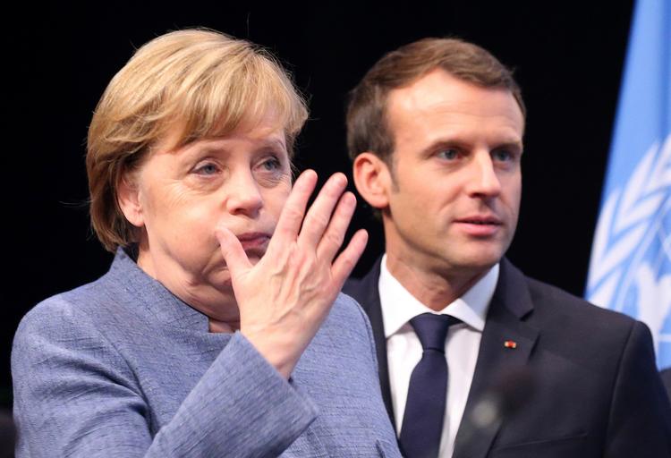 Tysklands kansler, Angela Merkel, fotograferet i går sammen med  Frankrigs præsident, Emmanuel Macron, ved klimatopmødet i Bonn.  