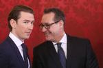 Sebastian Kurz (t.v.) og  Heinz-Christian Strache kan nu kalde sig kansler og vicekansler. 