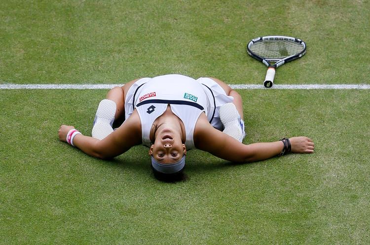 Marion Bartoli havde fået tennis nok, da hun vandt Wimbledon i 2013 (foto). Men hun har savnet spillet og forsøger et comeback i 2018. Kirsty Wigglesworth/AP