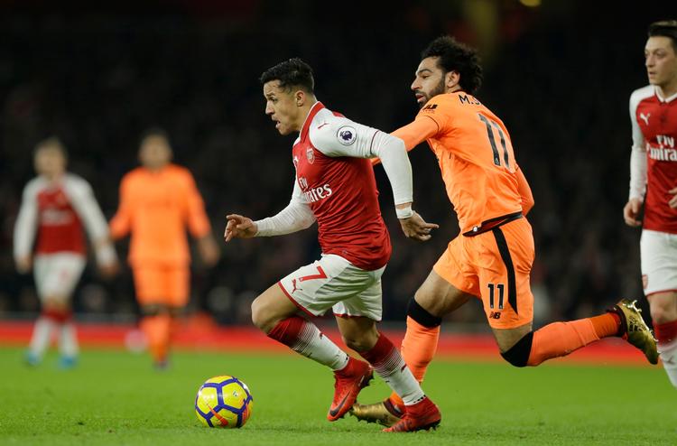 Både Alexis Sanchez (tv.) og Mohamed Salah (th.) fik scoret i den underholdende kamp. 