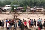 En tropisk storm har forårsaget mudderskred og oversvømmelser i store områder af Filippinerne, hvor dødstallet nu er steget til 200. Dette billede er fra fredag den 22. december i Lanao del Norte, på Zamboanga halvøen i det sydlige Filippinerne. 