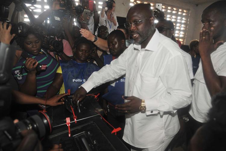 George Weah skal fremover lede Liberia, der er præget af stor fattigdom. 