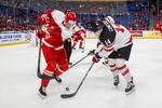 
Ved U20-VM i USA har Christian Larsen (tv.) og Danmark tabt til USA, Finland, Canada og Slovakiet, men den første nedrykningskamp blev vundet på dramatisk vis. 