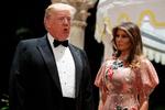Melania Trump var mildt sagt ikke begejstret ved udsigten til at blive førstedame. Her er præsidentparret fotograferet ved en nytårsaftensgalla på Donald Trumps foretrukne opholdssted Mar-a-Lago i Florida.
   