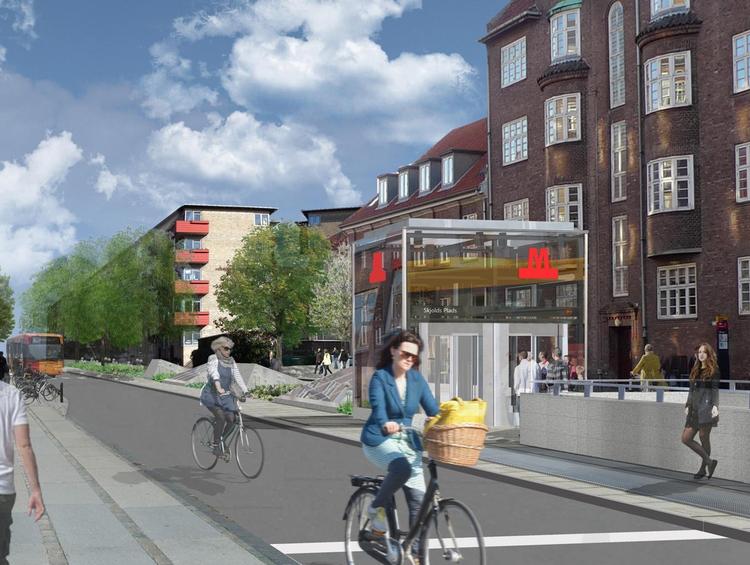 Stationens hovedtrappe, elevatorer og ovenlys bliver placeret på en midterrabat i Haraldsgade. 

På arealet, hvor Sigurdsgade og Fafnersgade før løb ud i Haraldsgade, bliver der dannet en plads. Her planter vi træer og opsætter bænker, så der opstår et nyt rekreativt opholdssted. 

Cykelparkeringen vil ske på udvidede fortovsarealer så tæt på hovedtrappen som muligt samt ved bagtrappen.  