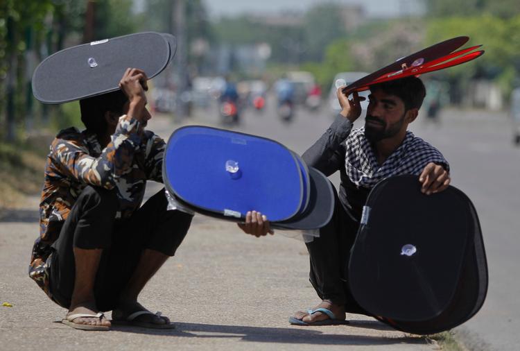 Gadesælgere i Indien i 2016. 