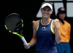 Caroline Wozniacki jubler efter sejren. 
