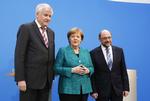 Angela Merkel holdt sammen med Martin Schulz og Horst Seehofer pressemøde om aftalen om en ny tysk regering.  Foto Ferdinand Ostrop