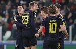 Christian Eriksen tiljubles af holdkammeraterne, efter danskeren har udlignet for Tottenham i Torino tirsdag aften.
     
