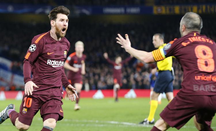Den sidste aflevering til Lionel Messis udligning kom fra Andres Iniesta. Alastair Grant/AP