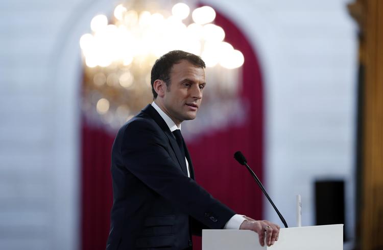 Præsident, Emmanuel Macron, vil fremme organiseret indvandring af udvalgte personer, som ifølge en ny rapport skal sikres langt bedre integration end i dag, mens grundløse asylansøgere hurtigt skal sigtes fra. Ian Langsdon/AP