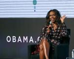 Michelle Obama og hendes mand
   Charles Rex Arbogast/AP