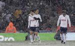Mens sneen dalede scorede Heung-Min Son Tottenhams femte mål mod Rochdale. Matt Dunham/AP