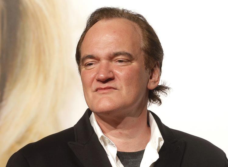 Quentin Tarantino har tidligere arbejdet med både Leonardo DiCaprio og Brad Pitt, men aldrig samtidig.  Laurent Cipriani/AP