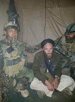 Abdul Wadood. den mystiske fange taler ifølge den afghanske hær tysk, mens han ikke mestre nogen af de afghanske hovedsprog. Wadood blev taget under en natlig aktion mod en bombefabrik i Helmand provinsen.
     Handout/Ritzau Scanpix