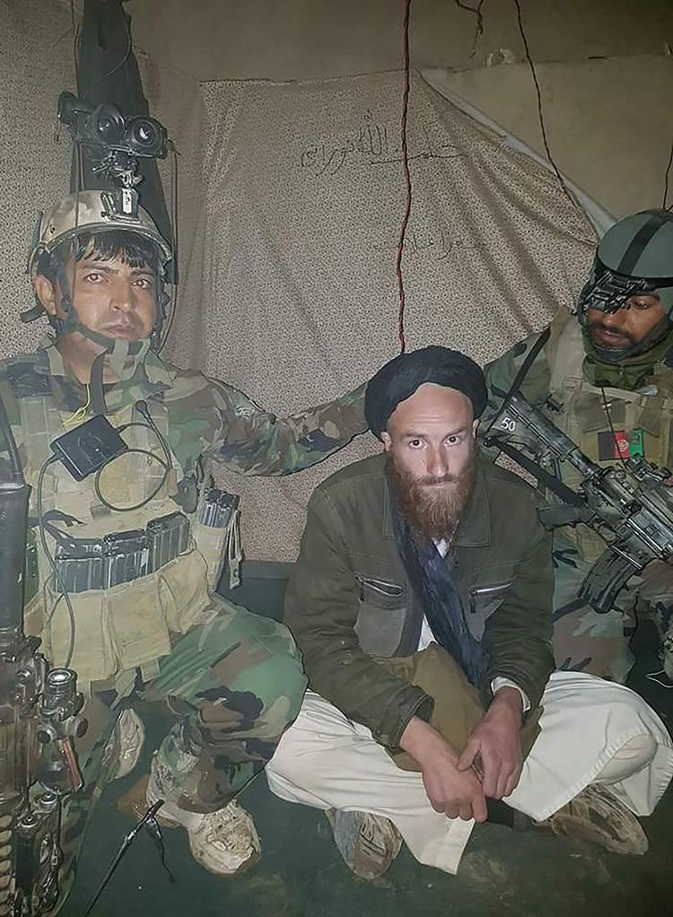 Abdul Wadood. den mystiske fange taler ifølge den afghanske hær tysk, mens han ikke mestre nogen af de afghanske hovedsprog. Wadood blev taget under en natlig aktion mod en bombefabrik i Helmand provinsen.
     Handout/Ritzau Scanpix