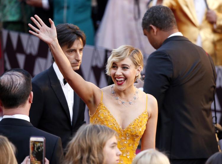 Greta Gerwig har med 'Barbie' instrueret den bedst sælgende film af en kvindelig instruktør nogensinde. Her ankommer hun til oscarfesten i 2018. I år blev hun ikke nomineret til Bedste instruktør, hvilket er blevet højlydt kritiseret.   Eric Jamison/AP