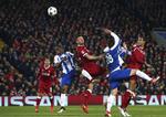 Et hovedstød fra Dejan Lovren - men mål blev der ikke... Dave Thompson/AP