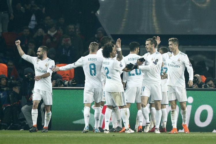 Målene blev scoret af Cristiano Ronaldo og Casimiro, da Real Madrid holdt kursen mod den tredje Champions League-titel i træk. Francois Mori/AP