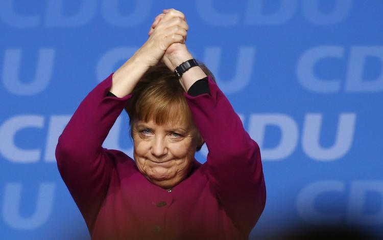 Angela Merkel har dannet ny regering med en række overraskelser iblandt. Ferdinand Ostrop/AP