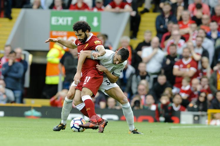 Sæsonens første opgør mellem de to storklubber sluttede 0-0 på Anfield.  Rui Vieira/AP