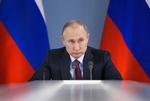 Præsident Putins økonomiske politik er forsigtig eller konservativ, og han vil hellere have orden i statens finanser end bruge penge på at få mere fart i økonomien. Alexei Druzhinin/AP