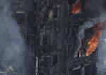 Branden raserede et  beboelsestårn i London - og lokkede tilsyneladende flere bedragere til, da der var udsigt til billige erstatningsboliger og gode støtteordninger for de overlevende. Matt Dunham/AP