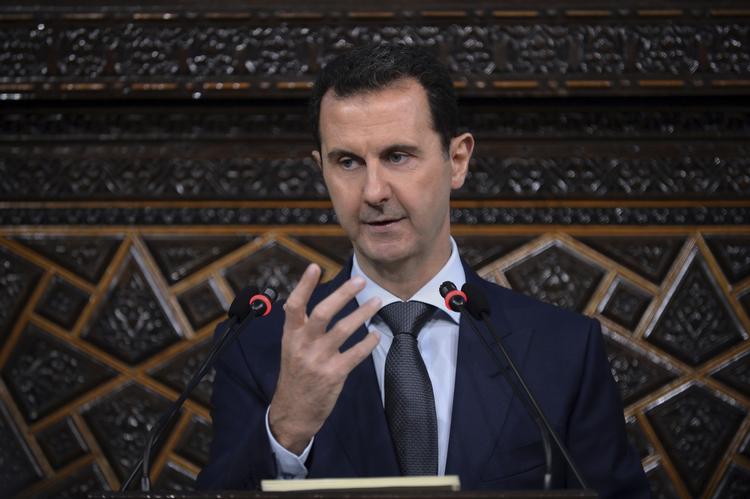 I dag er det syv år siden, krigen i Syrien begyndte. Det er lykkedes for præsident Bashar Assad at klamre sig til magten ved ikke mindst Ruslands hjælp. Uncredited/AP