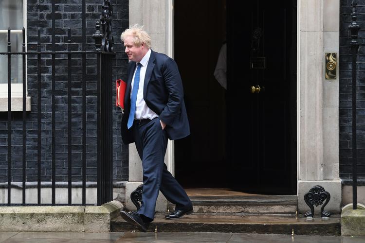 Boris Johnson forlader Downing Street 10 efter et møde om forgiftningen af den tidligere russiske spion Sergej Skripal for et par dage siden. Stefan Rousseau/AP