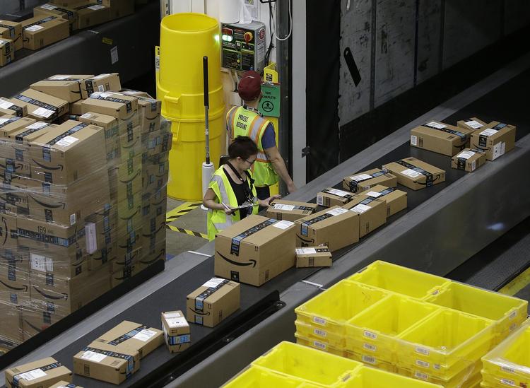 Det amerikanske firma Amazon har nu en markedsværdi på 768 milliarder dollars - svarende til 4.650 milliarder kroner. Rich Pedroncelli/AP