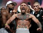 Conor McGregors seneste aktion i en ring var i boksning i den hypede showkamp mod Floyd Mayweather i august 2017. Nu er han anholdt for voldelige protester efter udsigt til at miste sit bælte i UFC (Ultimate Fighting Champion). Foto: AP/John Locher
   John Locher/Ritzau Scanpix