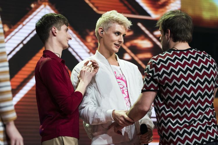 Sigmund (i midten) nåede til semifinalen i årets 'X Factor'. Men vi har ikke hørt det sidste til ham. Han har i hvert fald flere tilbuds på hånden.  Martin Sylvest/Ritzau Scanpix