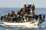 'Generalen' anses for at være en af de mere aktive menneskesmuglere bag strømmen over Middelhavet for et par år siden. Nu tvivler flere medier på, at italiensk politi fik fat i den rette, da han blev meldt anholdt. Arkivfoto. Antonello Nusca/AP
