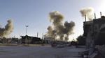 Den syriske by Douma har været udsat for hårde kampe længe, men nu hævder russerne, at syriske regeringsstyrker har taget fuld kontrol over byen. Billedet er fra et syrisk luftangreb i sidste uge.  /AP