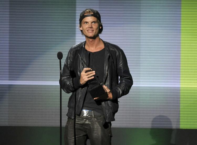 Her modtager Tim Bergling i 2013 en pris ved American Music Awards i Los Angeles i 2013 for at være årets kunstner inden for genren EDM. John Shearer/AP