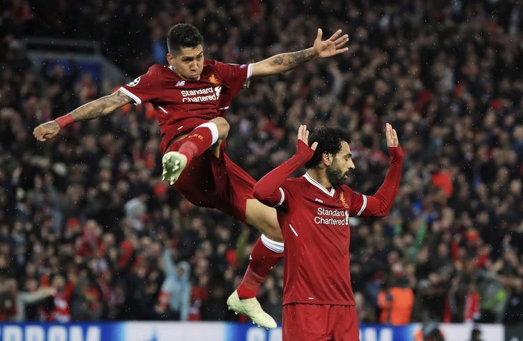 Efter sine scoringer til 1-0 og 2-0 mod sin tidligere klub var  Mohamed Salah noget mere afdæmpet end den flyvende Roberto Firmino. Peter Byrne/AP